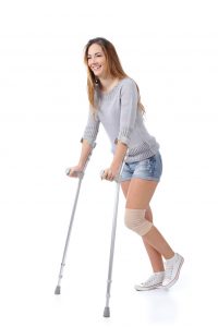 Woman With Crutches